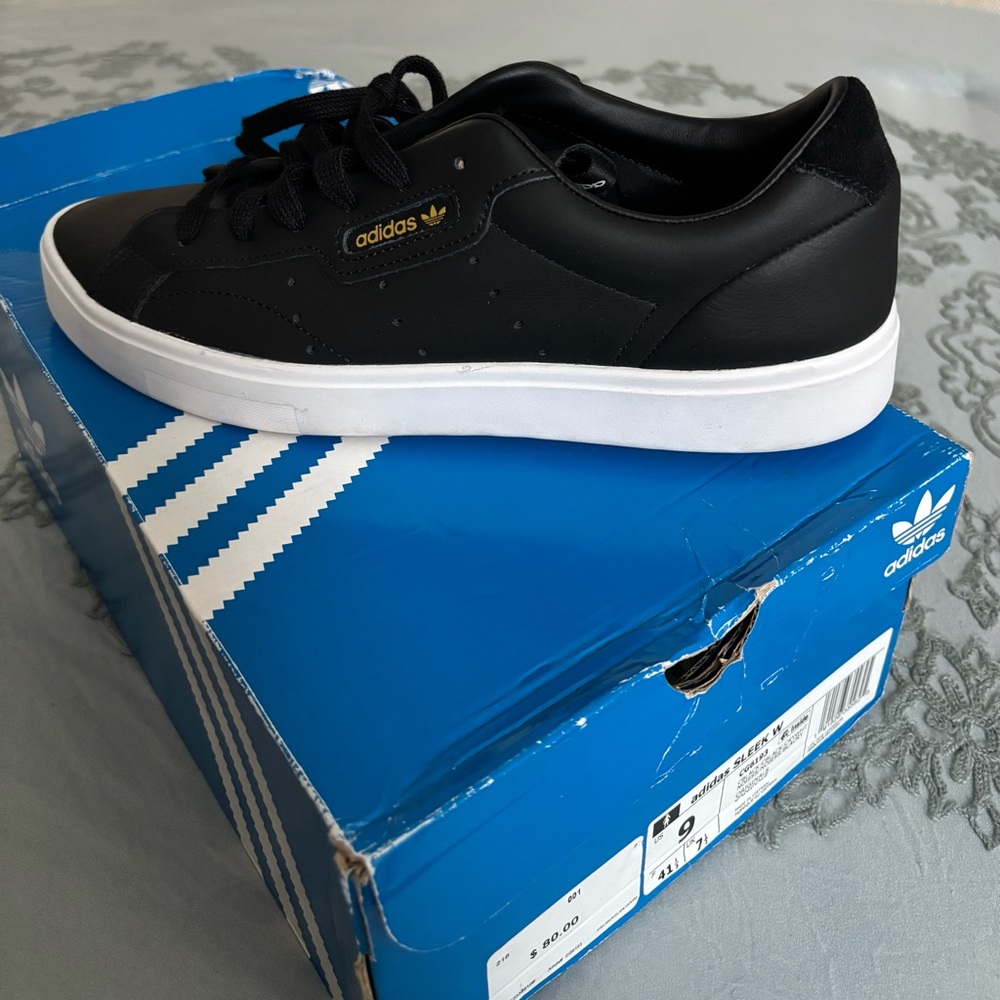 Adidas women’s Black and White Sneakers